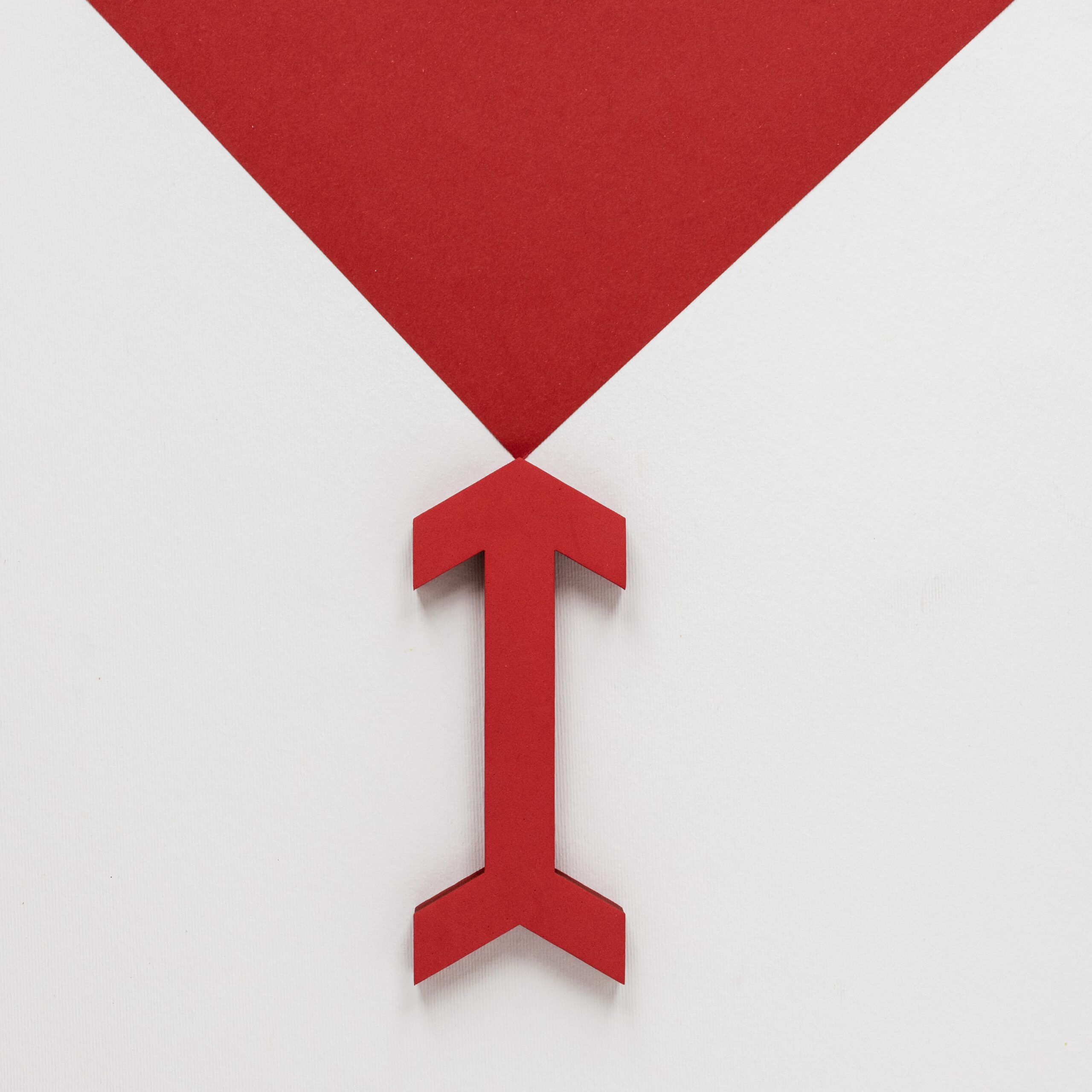 flat-lay-red-arrow-arrowhead-white-background